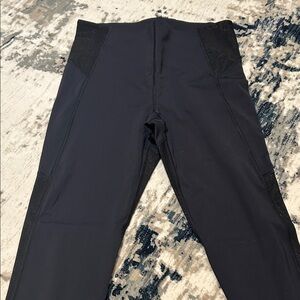 Athleta stay fly reflective 7/8 tight. Never worn.